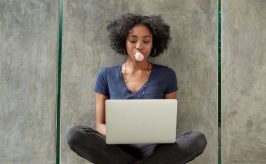 Student learning on her laptop